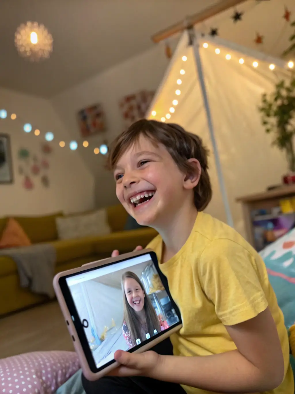 A child excitedly pressing the big red button on the Fun Button app, illustrating the ease of use and instant access to play ideas.